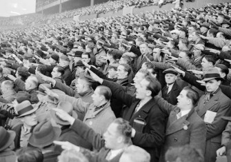 German football supporters giving the Nazi salute, White Hart Lane, London, 1935. Mirrorpix/Alamy Stock Photo.