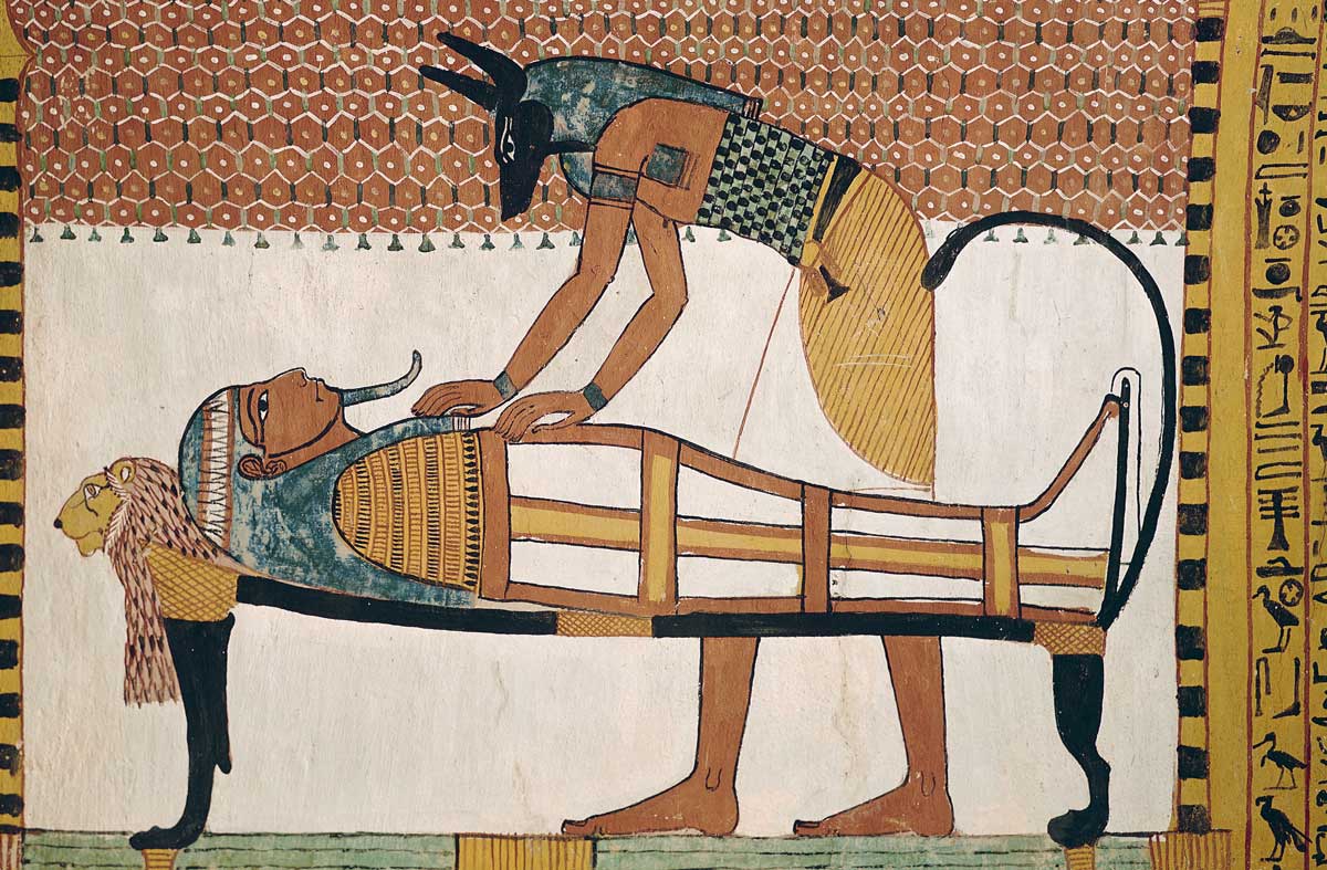 Anubis attending Sennedjem’s mummy, c.1292-1187 BC © Bridgeman Images.