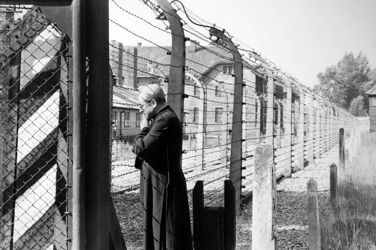 Jean-Marie Lustiger, a French cardinal of Jewish heritage, visits Auschwitz, 23 June 1983 © Jean-Claude Francolon/Gamma-Rapho/Getty Images.