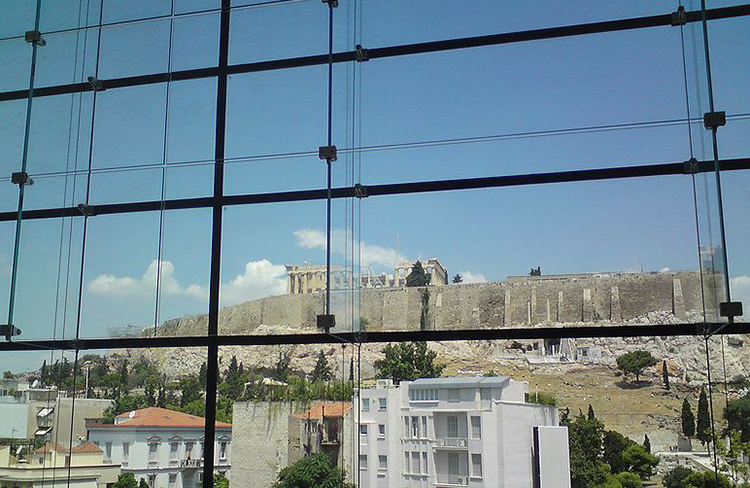 The Acropolis seen from the interior of the Acropolis Museum, Athens. 