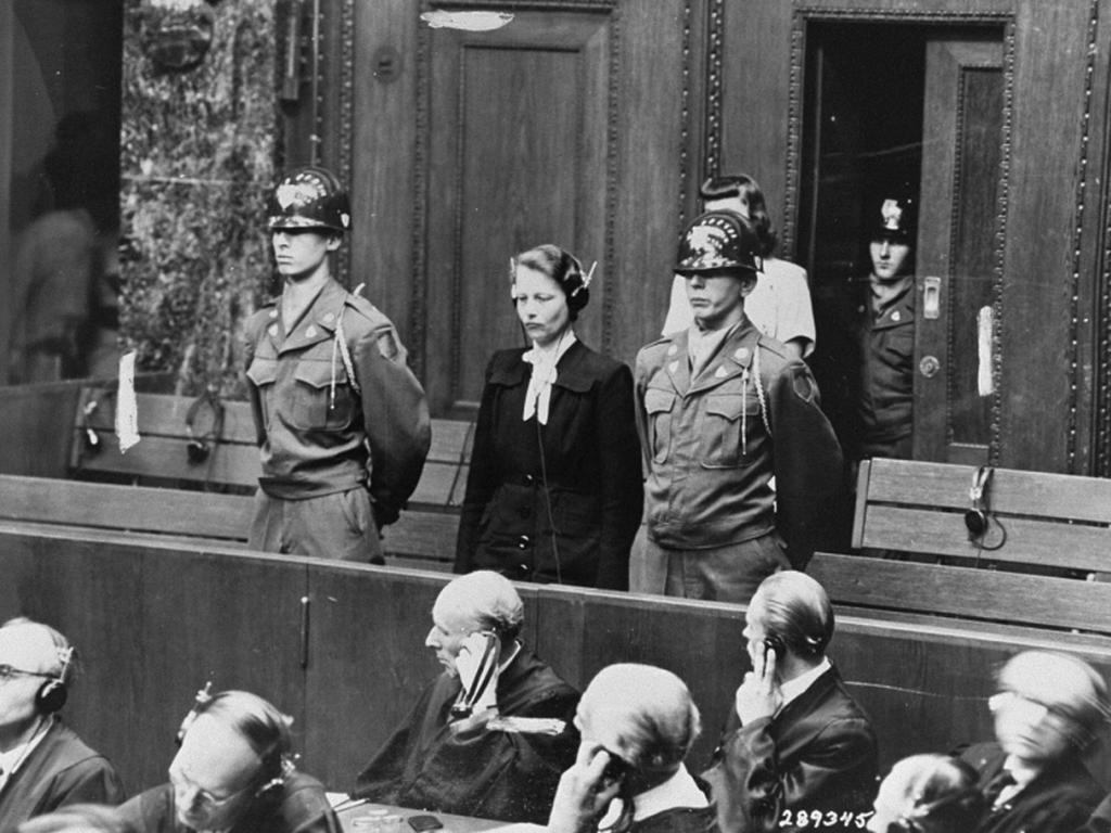 Defendant Herta Oberheuser stands up to receive her sentencing at the Doctors' Trial, Nuremberg 1947. Defendant Herta Oberheuser stands up to receive her sentencing at the Doctors' Trial, Nuremberg 1947.