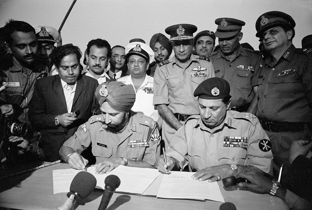Lt Gen Jagit Singh Aurora, (left) and Lt Gen Amir Abdullah Khan Niazi sign the peace treaty that turned East Pakistan into Bangladesh, Dhaka, 1971.