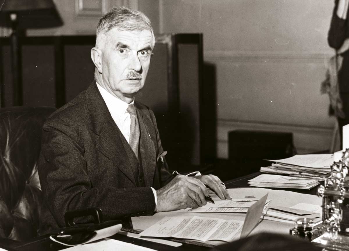 Home Secretary James Chuter Ede at his desk, c.1950 © Hulton Getty Images.