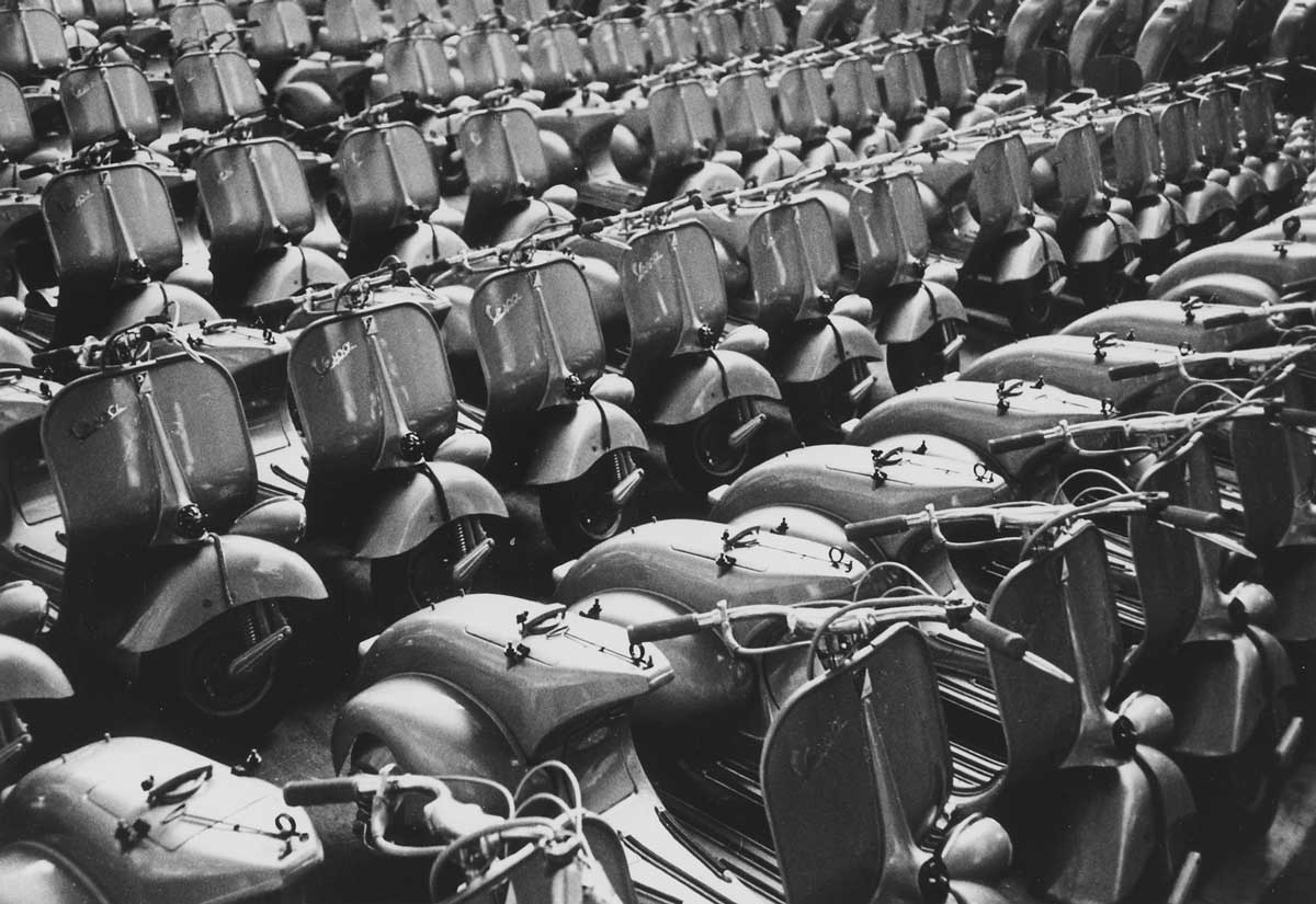 'Italy. With the help of Marshall Plan funds, a new product rolled out of the factory, the Vespa Piaggio plant at Pontedera near Pisa, Italy.' c. 1948-1955. US National Archives.