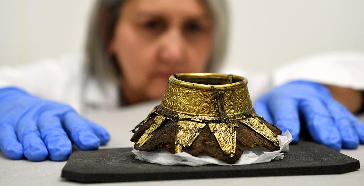 Conservator Claire Reed with the remains of a drinking vessel discovered at Prittlewell, Essex, in 2003 © Press Association Images