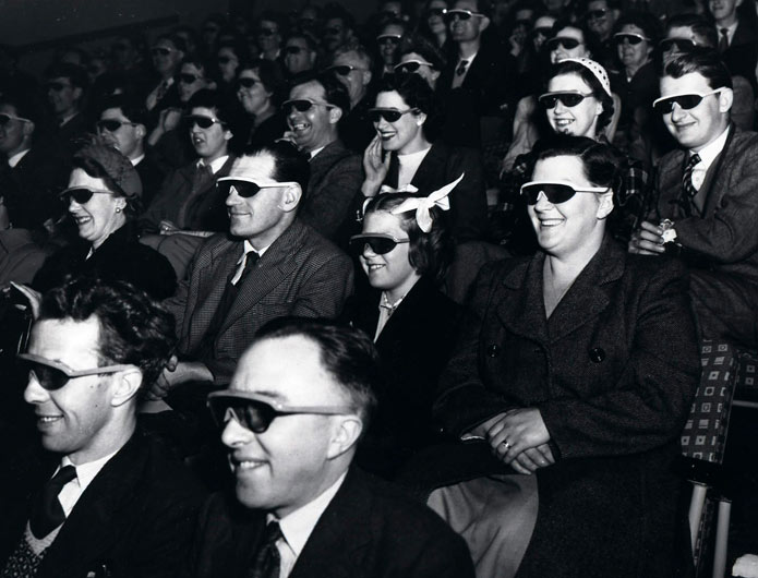 Audience wearing special glasses watch a 3D ‘stereoscopic film’ at the Telekinema on the South Bank in London during the Festival of Britain.
