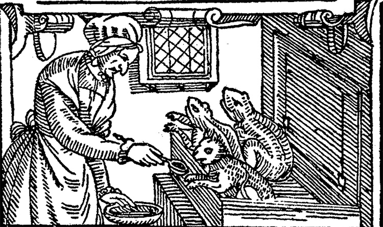 A witch feeding her toad-imps in a 1630 woodcut.