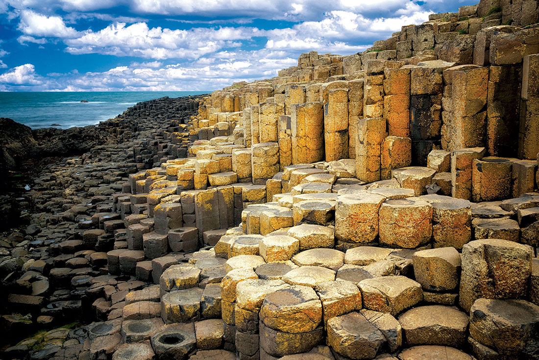 Giant’s Causeway, Antrim. According to the Fenian Cycle, Fionn mac Cumhaill, an Irish giant, was challenged to a fight by his Scottish rival Benandonner. Accepting the challenge, he built the causeway so that they could meet.