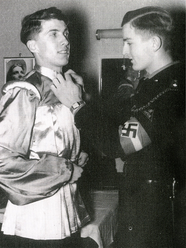 Two Hitler Youth members prepare for an amateur production of Shakespeare, June 1940