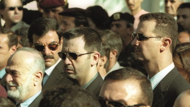 President Bashar al-Assad (right) and his brother Maher (centre) attend the funeral of their father Hafez, Damascus, June 13th 2000 (Getty/AFP/Ramzi Haidar)
