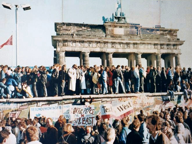 The Fall of the Berlin Wall, 1989. The photo shows a part of a public photo documentation wall at Former Check Point Charlie, Berlin.