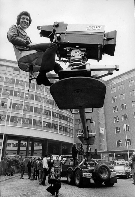 Singer Tom Jones rides a crane at BBC Television Centre, 1971. 