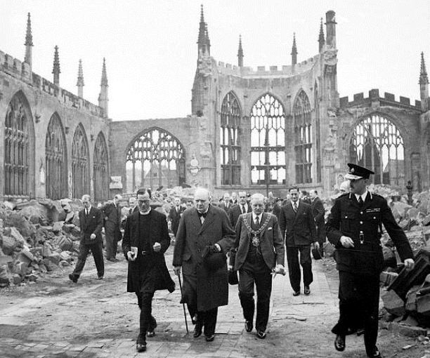 Winston Churchill visiting the ruins of Coventry Cathedral following its destruction in the Coventry Blitz of 14/15th November 1940.