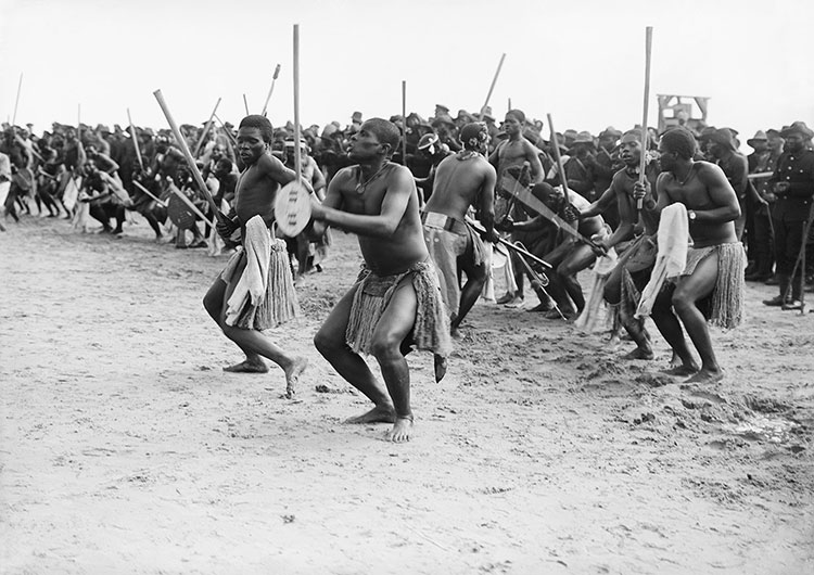 Soldiers of the South African Native Labour Corps perform a 'Zulu war dance'