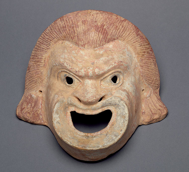 Greek comedy mask, terracotta, second century BC. 