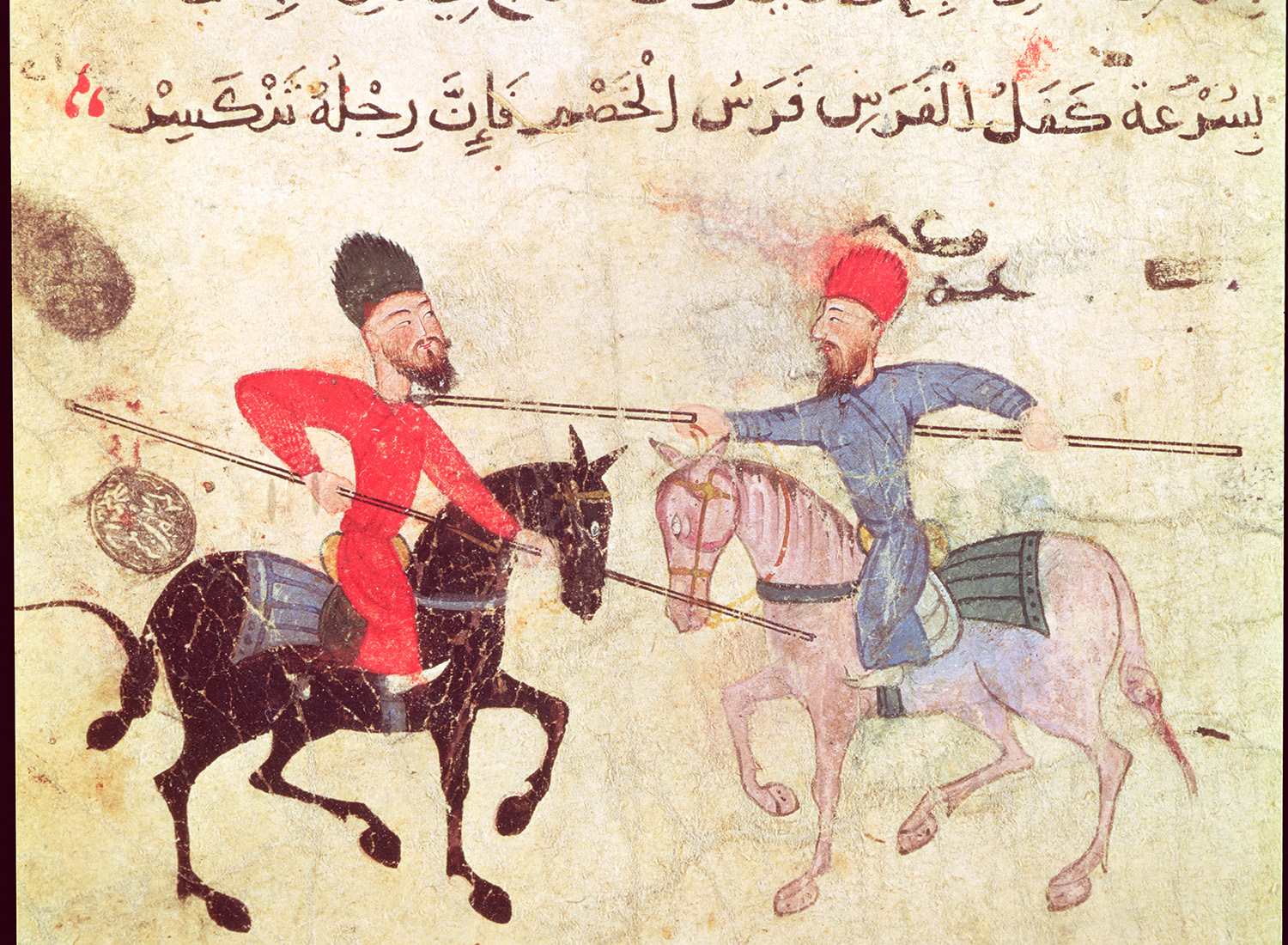 Two men duelling on horseback, Egyptian manuscript from Fustat, Old Cairo, 12th century. (Bridgeman Images/Museum of Islamic Art, Cairo)
