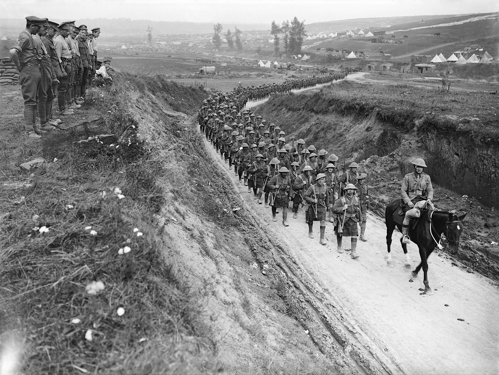 Gordon Highlanders march to the trenches along the Bercodel-Fricourt road, October 1916