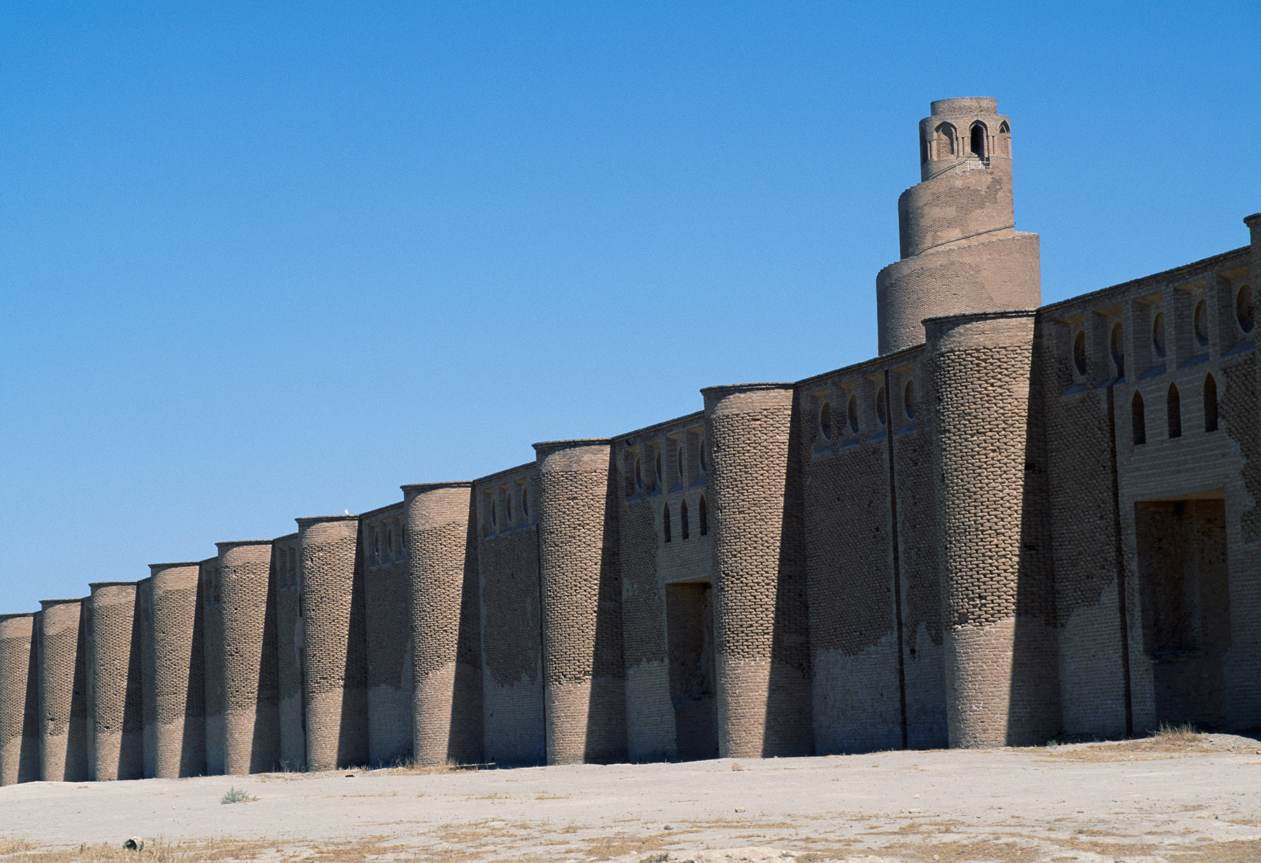 The walls and minaret of the Abu Dulaf mosque, Samarra, Iraq, ninth century.