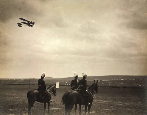 A military biplane flies over Salisbury Plain c. 1914. Getty Images/SSPL