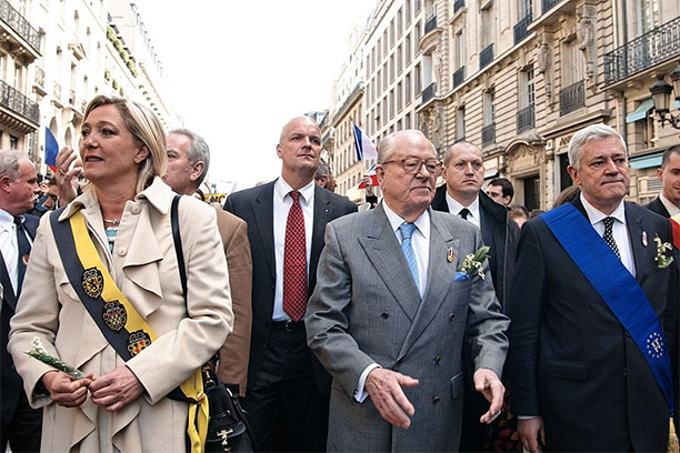 Marine Le Pen, Jean-Marie Le Pen and Bruno Gollnisch, May 1st 2010 at the Front National's rally in honour of Joan of Arc. By Marie-Lan Nguyen