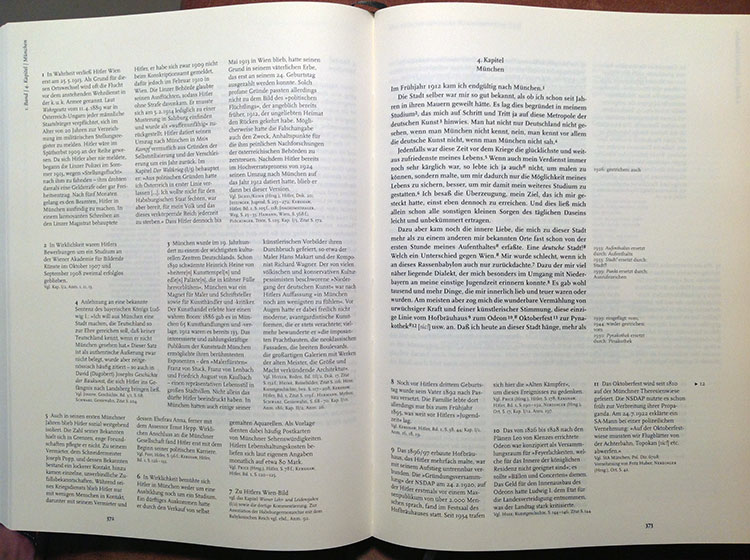 A page from the Munich edition. Hitler's text (centre right) is encircled by notes about changes between editions (far right) and notes correcting factual errors, filling historical gaps and tracing the origins of key ideas (left and bottom). 