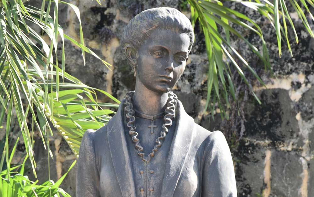 Statue of Salomé Ureña in the Ciudad Colonial of Santo Domingo, Dominican Republic.
