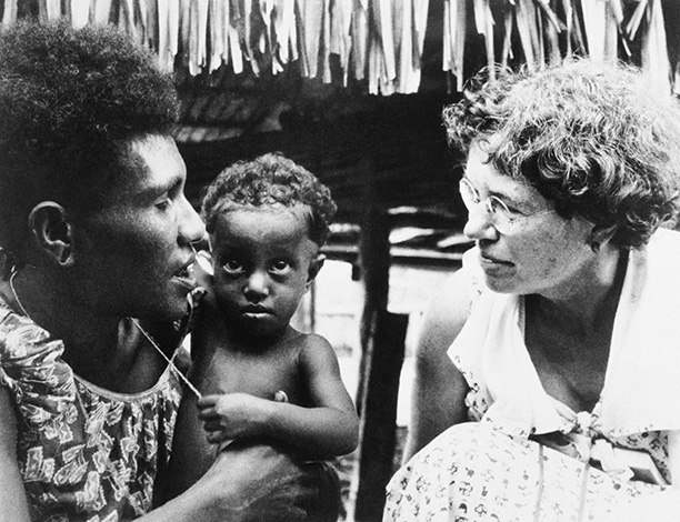 Margaret Mead with a Manus mother and child during a visit to the Admiralty Islands in 1953. Corbis / Bettmann