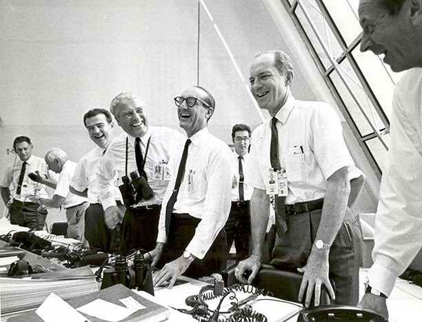 Officials at the Launch Control Center in Houston, Texas following the Apollo 11 mission's lift-off, with Werner von Braun, George E. Mueller and General Samuel C. Phillips at the centre. NASA