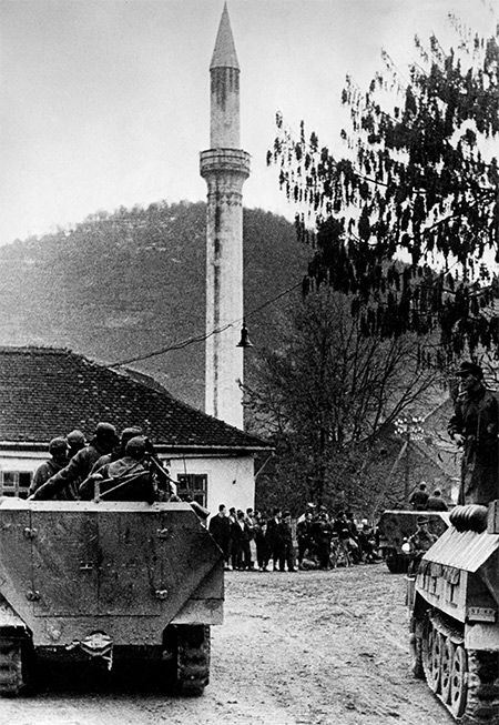 German armoured personnel carriers in a Bosnian Muslim village, 1944. German armoured personnel carriers in a Bosnian Muslim village, 1944.