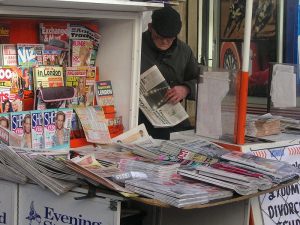 A newspaper vendor in London. Photograph by KF