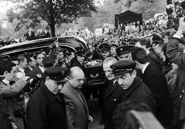 Voice of the people: Piaf's coffin is carried through Pere Lachaise cemetery