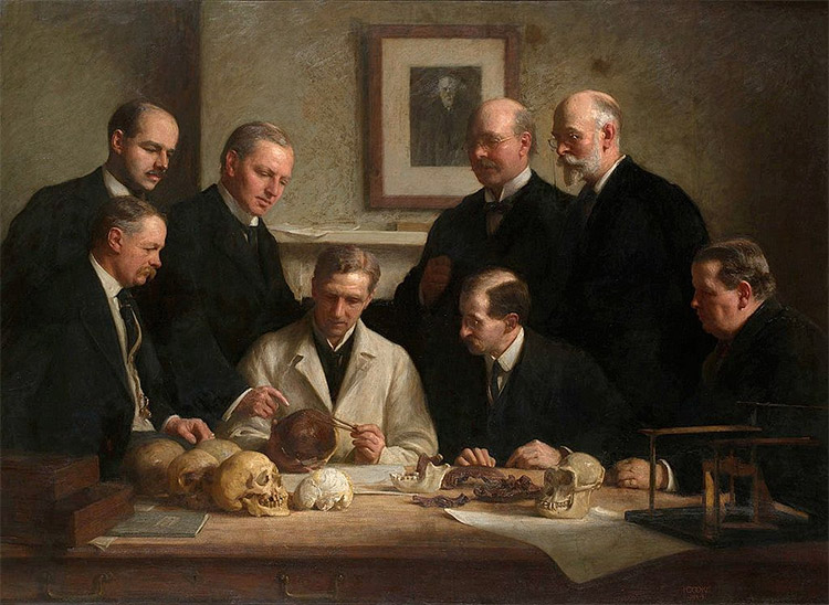 Group portrait of the Piltdown skull being examined