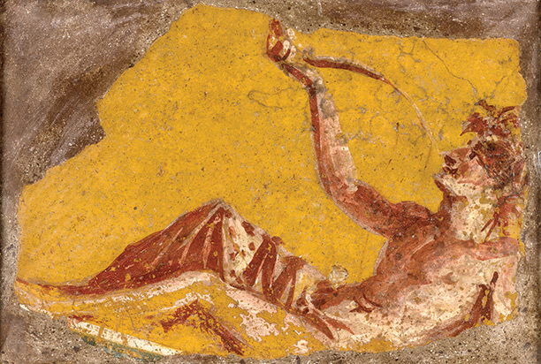 Simple pleasures: fragment of a wall painting from Pompeii showing a man drinking wine. First century AD.