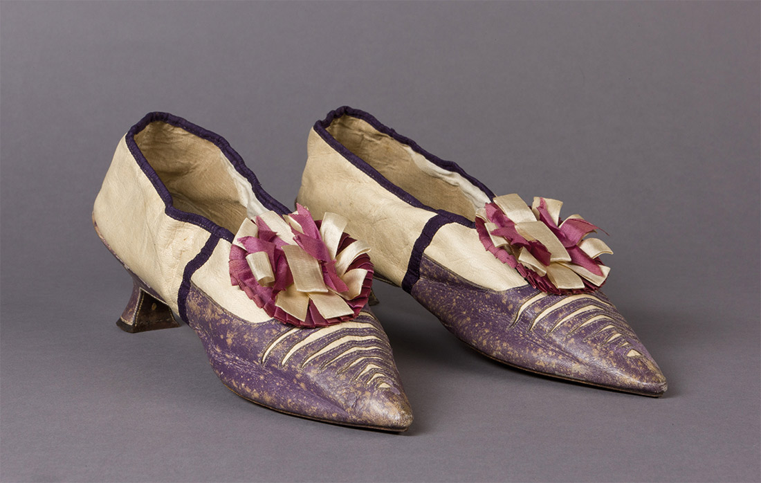 Court shoes of ‘Mrs Broughton Rowse’, in kid leather with silk rosettes, c.1790s.