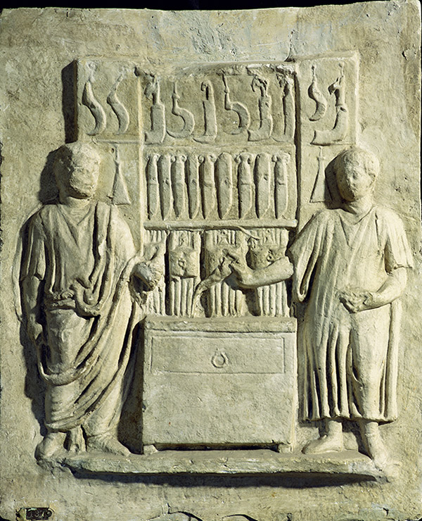 The gravestone of a Roman cutler with a relief of a shop selling knives and sickles, second century AD. Bridgeman/Museo della Civilta Romana, Rome