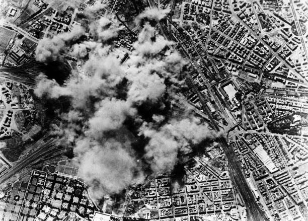 Smoke clouds over the marshalling hub in the San Lorenzo district after an Allied bombing raid, 1943. Getty Images/Hulton Archive