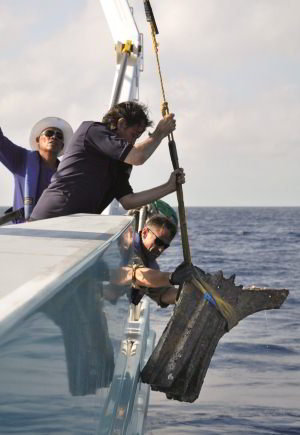 The most recently discovered ship ram, Egadi 3, in the process of being raised from the seabed, September 2010. (Regione Siciliano/George Robb,RPM Nautical Foundation, Florida)