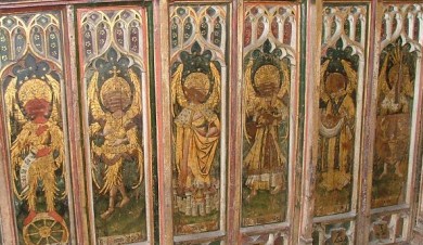 The medieval screen depicting the nine orders was defaced by William Dowsing at the church of St Edmund, Southwold, Suffolk. 'We brake 130 superstitious pictures,' he wrote of his visit there, in April 1643.