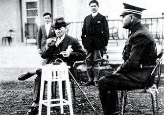 Mustafa Kemal Atatürk drinking coffee at his farm near Ankara, August 3rd, 1929. Copyright aka-images