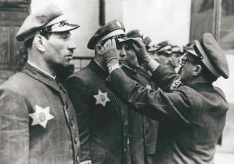 Members of the Jewish police in the Warsaw ghetto, 1941. Akg-images.