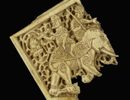 An Egyptian ivory plaque showing two figures riding an elephant, c. 11th-12th century. Walters Art Museum (CC0).