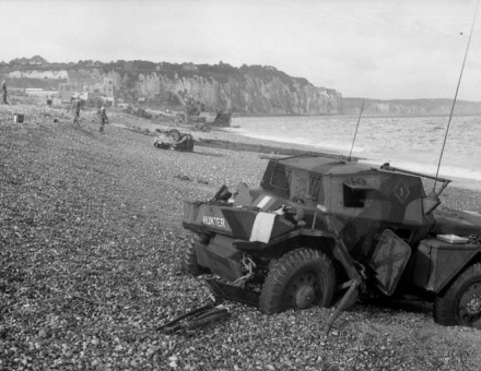 Dieppe's chert beach and cliff immediately following the raid on 19 August 1942. A Dingo Scout Car has been abandoned.