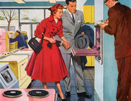 Couple in a US appliance store buying a new wall oven, 1956