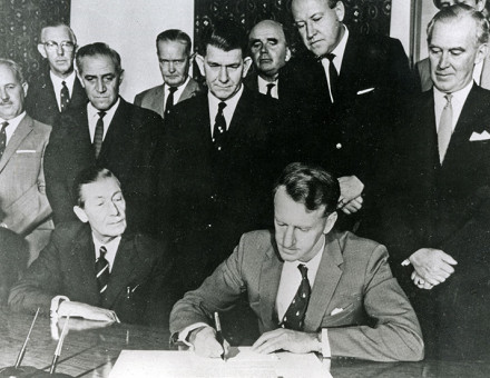 Ian Smith, prime minister of Rhodesia, signs his country's Unilateral Declaration of Independence, November 11th, 1965.
