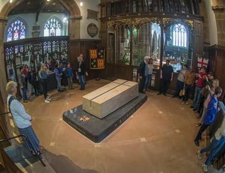 Visitors circulate around Richard's tomb in the chancel.