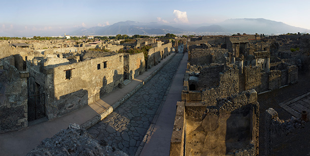 Staying put: Pompeii today, with the looming presence of Vesuvius in the background. British Museum