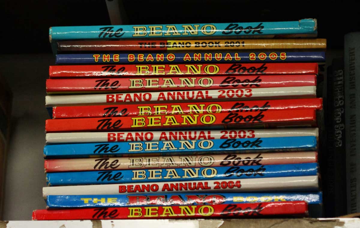 A stack of Beano annuals on a bookshelf. Alamy. A stack of Beano annuals on a bookshelf. Alamy.