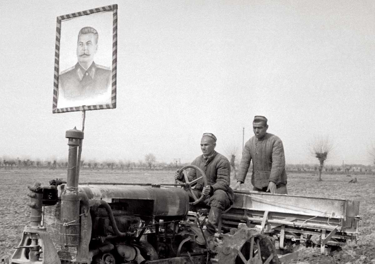 Tractor with Stalin’s portrait, Uzbekistan, c.1940 © Max Penson/Getty Images.
