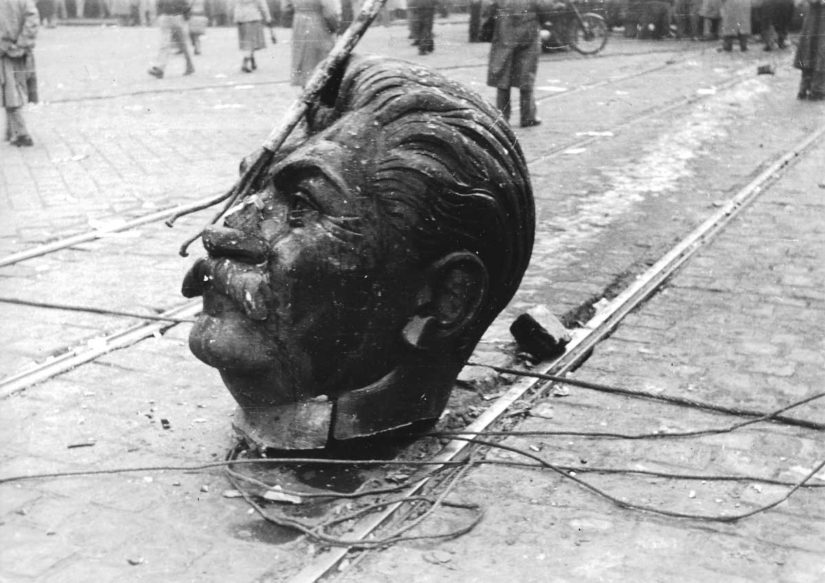 Head from the Stalin monument on the Grand Boulevard, Budapest. The statue was destroyed on October 23, 1956, and a monument of the 1956 Revolution is now in its place. Fortepan/Wiki Commons.