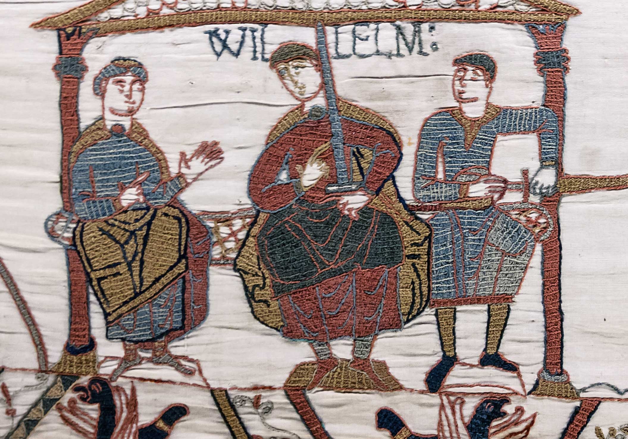 Scene 44 from the Bayeux Tapestry. Left to right: Bishop Odo of Bayeux, Duke William, Count Robert of Mortain. Wiki Commons/Myrabella